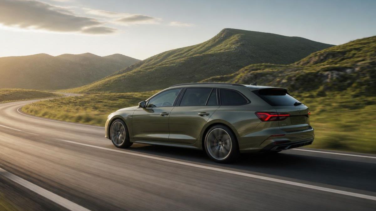 AWD wagon driving along a scenic mountain road, illustrating long-term reliability when properly maintained