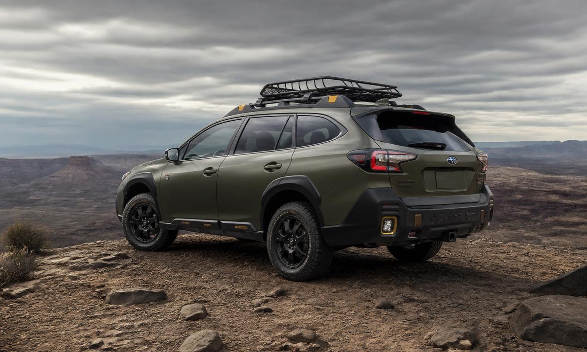 2026 Subaru Outback Wilderness rear three-quarter view on a desert overlook with a roof basket