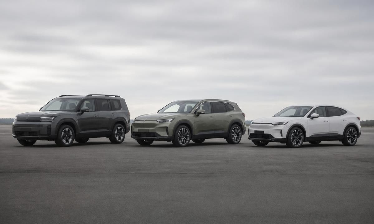Three different modern crossover SUVs from competing brands parked side by side