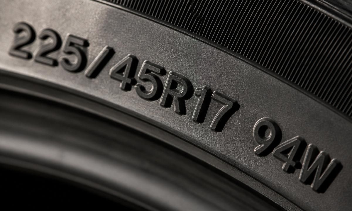Tire sidewall detail showing the service description 225/45R17 94W, indicating load index and speed rating