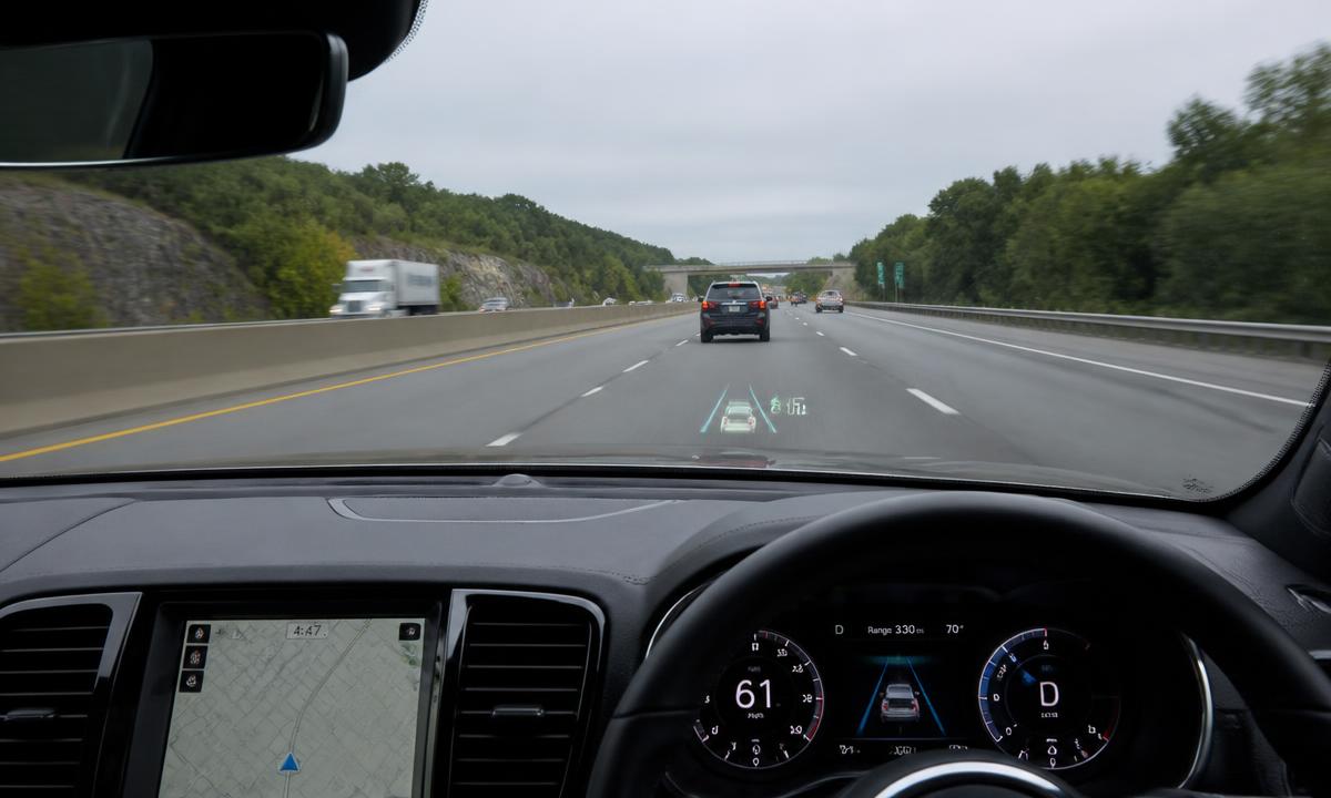 Driver assistance display and head-up readout on a highway from behind the wheel